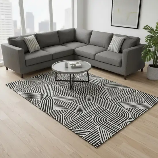 Black And Ivory Abstract Geometric Washable Area Rug With UV Protection Photo 2