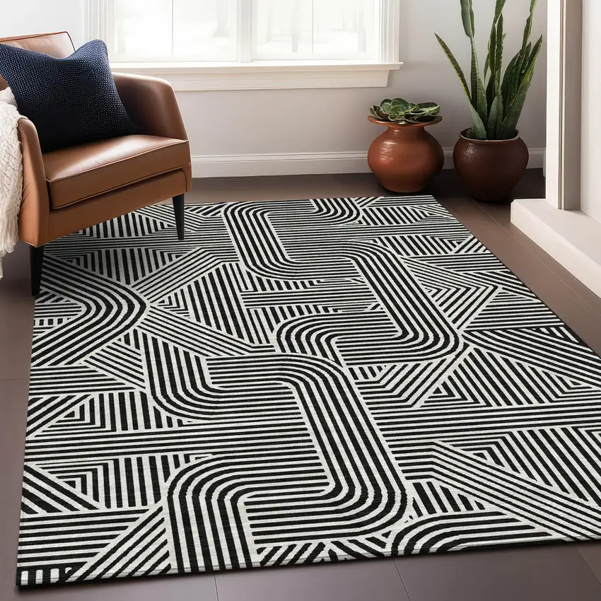 Black And Ivory Abstract Geometric Washable Area Rug With UV Protection Photo 5