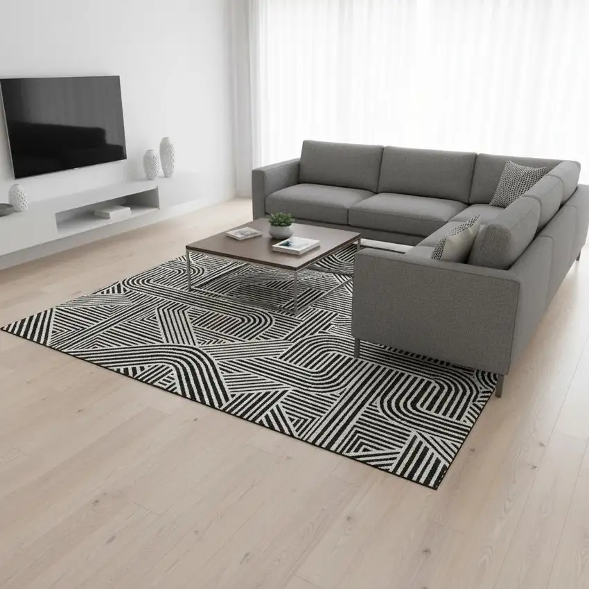 Black And Ivory Abstract Geometric Washable Area Rug With UV Protection Photo 2