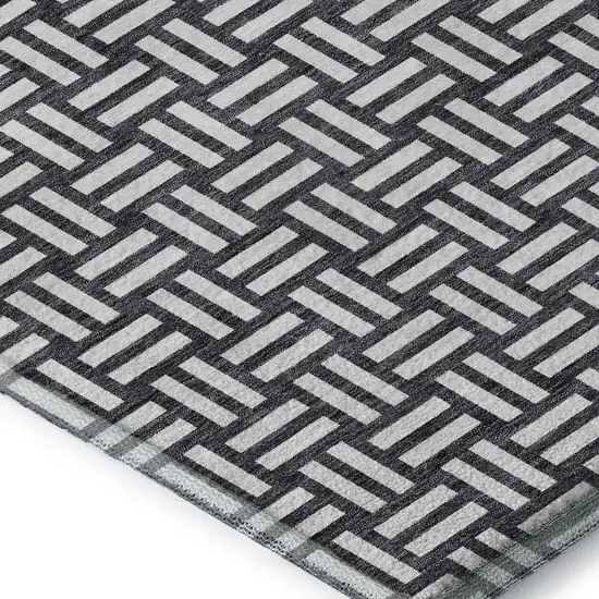 Black And Ivory Abstract Geometric Washable Area Rug With UV Protection Photo 2