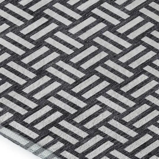 Black And Ivory Abstract Geometric Washable Area Rug With UV Protection Photo 2