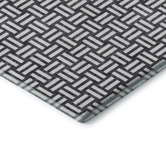 Black And Ivory Abstract Geometric Washable Area Rug With UV Protection Photo 1