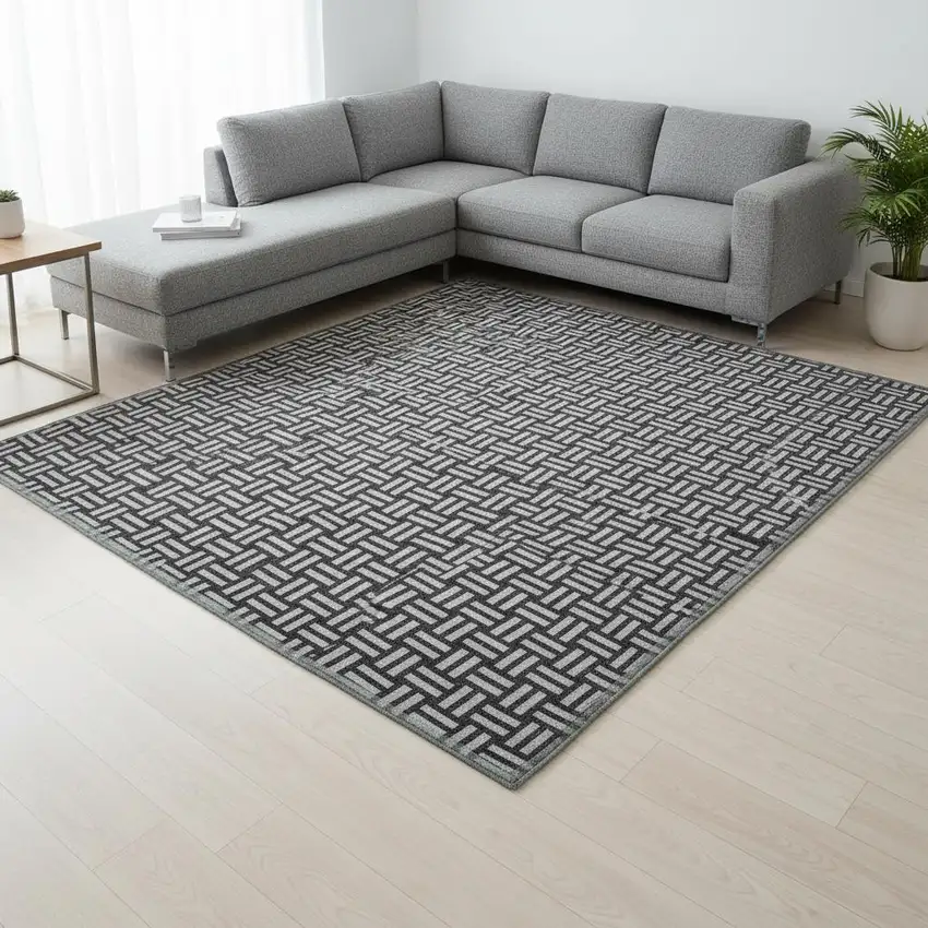 Black And Ivory Abstract Geometric Washable Area Rug With UV Protection Photo 2