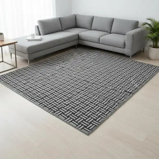 Black And Ivory Abstract Geometric Washable Area Rug With UV Protection Photo 2