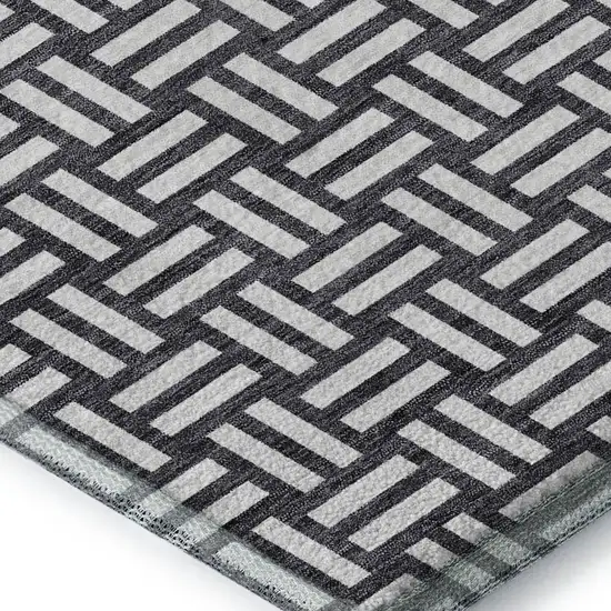 Black And Ivory Abstract Geometric Washable Area Rug With UV Protection Photo 2