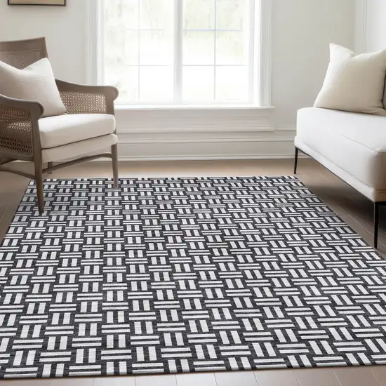 Black And Ivory Abstract Geometric Washable Area Rug With UV Protection Photo 5