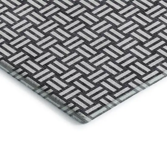 Black And Ivory Abstract Geometric Washable Area Rug With UV Protection Photo 2