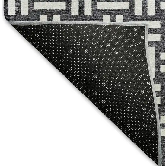 Black And Ivory Abstract Geometric Washable Area Rug With UV Protection Photo 6