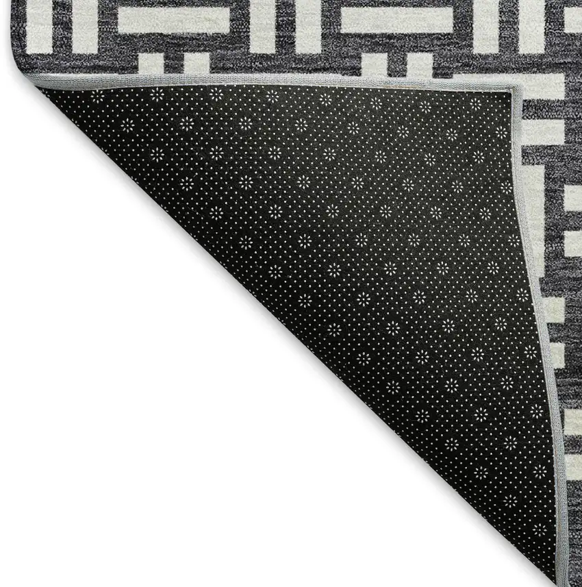 Black And Ivory Abstract Geometric Washable Area Rug With UV Protection Photo 6