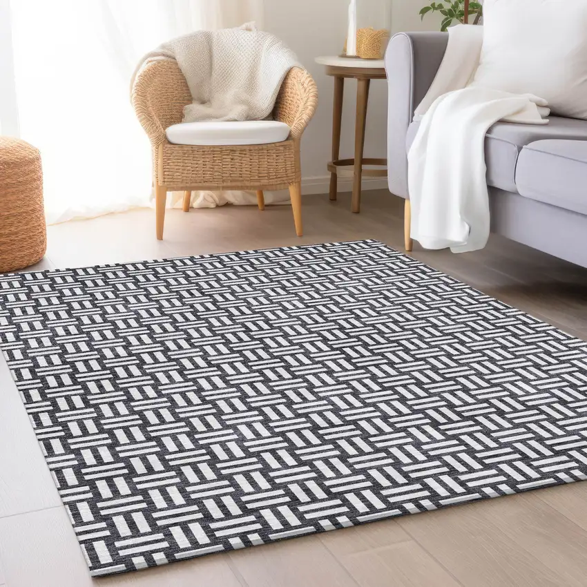Black And Ivory Abstract Geometric Washable Area Rug With UV Protection Photo 3