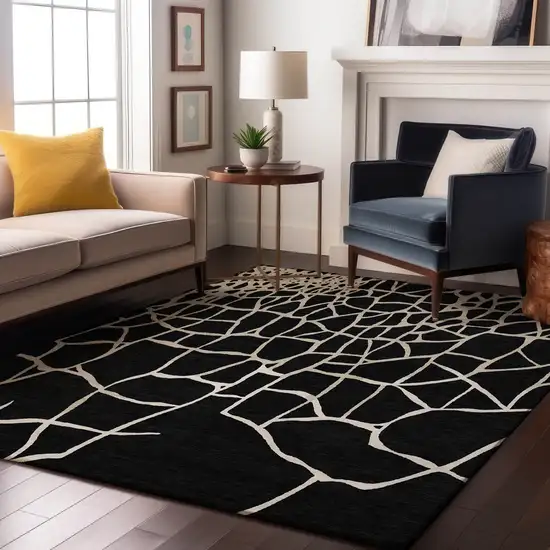 Black And Ivory Abstract Geometric Washable Area Rug With UV Protection Photo 3