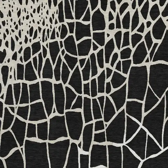 Black And Ivory Abstract Geometric Washable Area Rug With UV Protection Photo 4