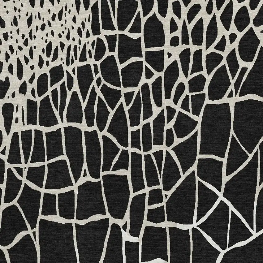 Black And Ivory Abstract Geometric Washable Area Rug With UV Protection Photo 4