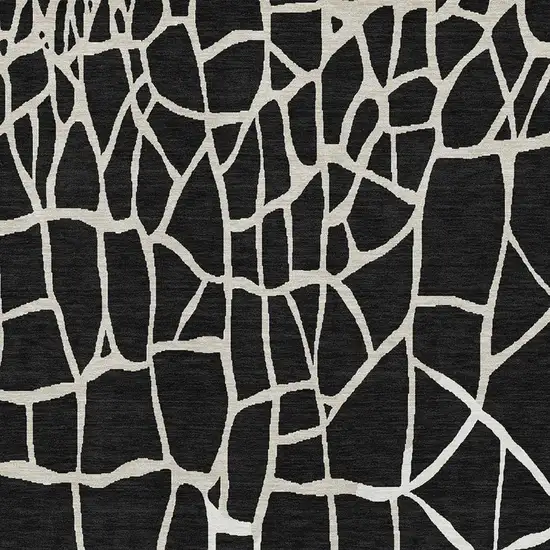 Black And Ivory Abstract Geometric Washable Area Rug With UV Protection Photo 3