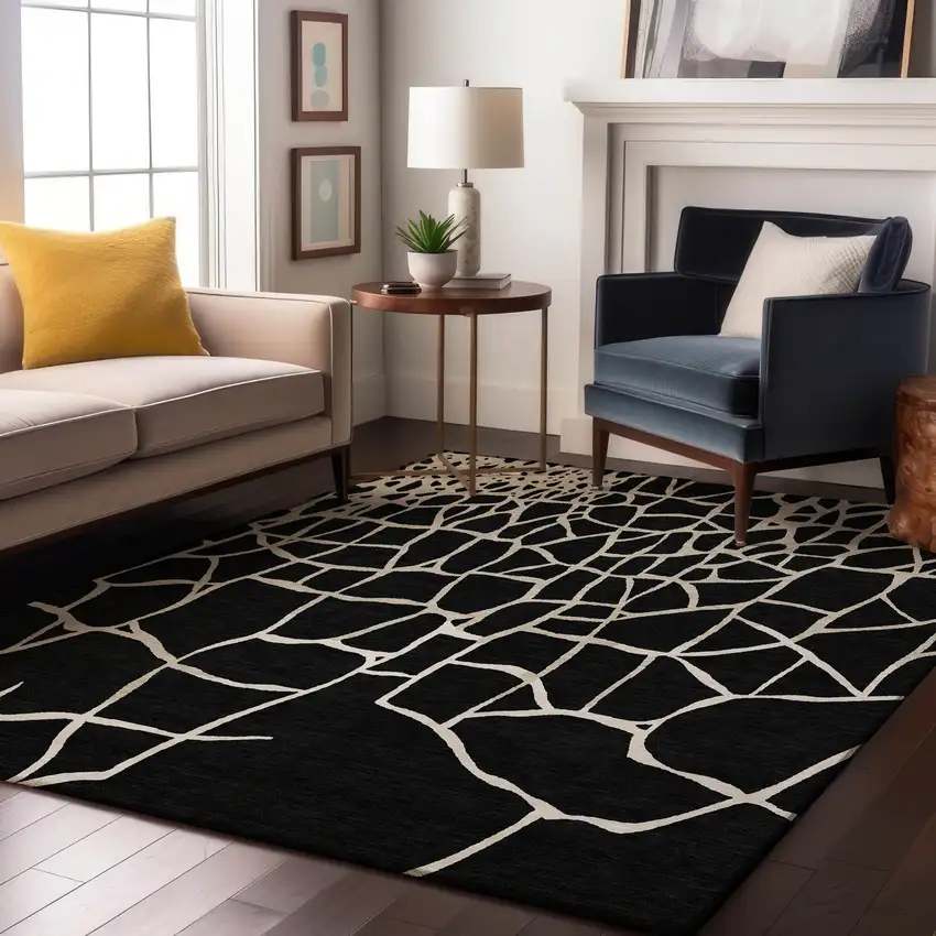Black And Ivory Abstract Geometric Washable Area Rug With UV Protection Photo 4