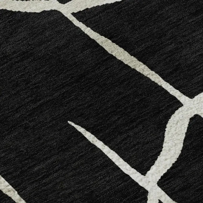 Black And Ivory Abstract Geometric Washable Area Rug With UV Protection Photo 2