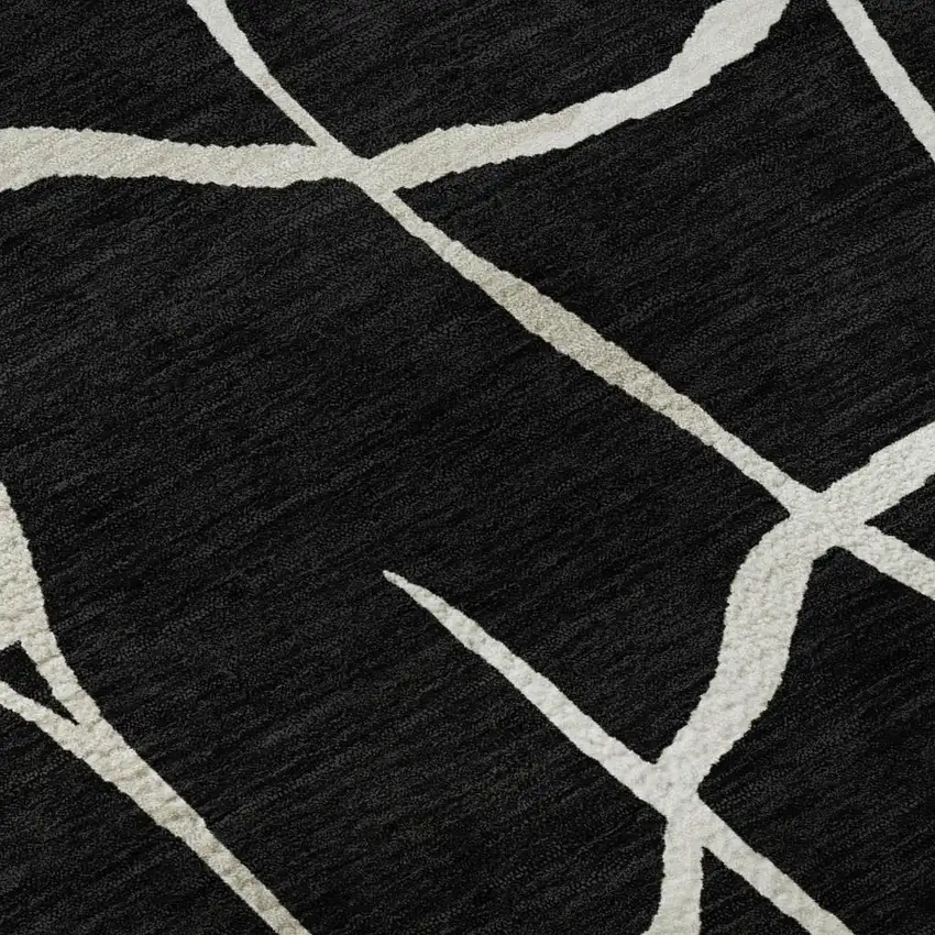 Black And Ivory Abstract Geometric Washable Area Rug With UV Protection Photo 3