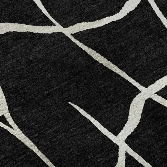 Black And Ivory Abstract Geometric Washable Area Rug With UV Protection Photo 2