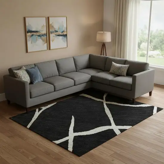 Black And Ivory Abstract Geometric Washable Area Rug With UV Protection Photo 2