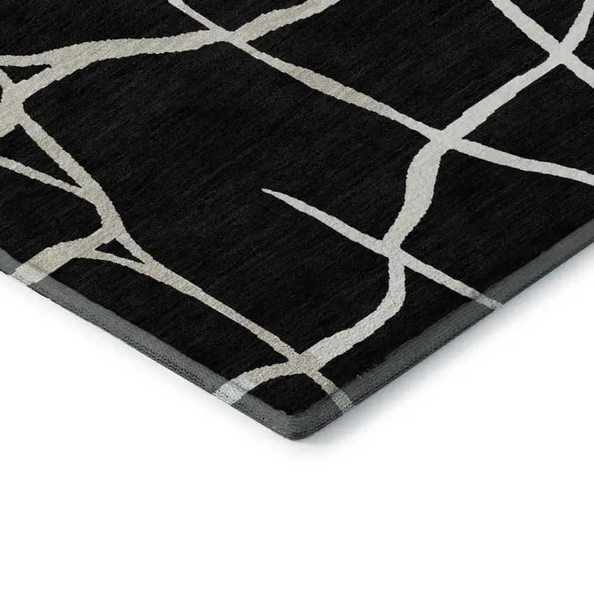 Black And Ivory Abstract Geometric Washable Area Rug With UV Protection Photo 8
