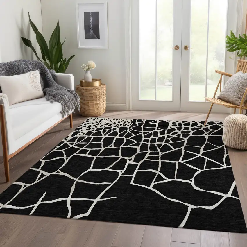 Black And Ivory Abstract Geometric Washable Area Rug With UV Protection Photo 5