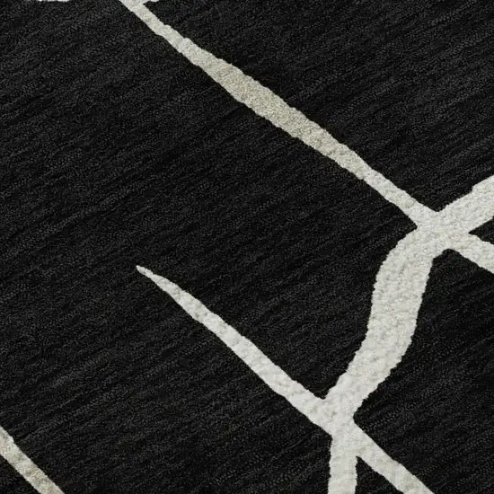 Black And Ivory Abstract Geometric Washable Area Rug With UV Protection Photo 2
