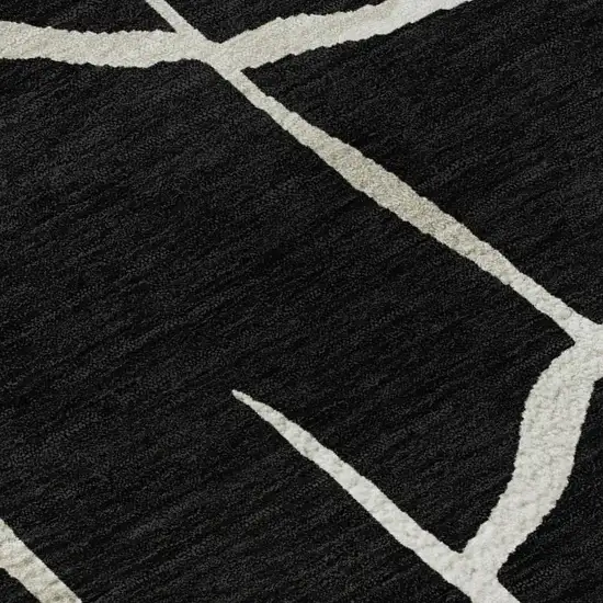 Black And Ivory Abstract Geometric Washable Area Rug With UV Protection Photo 2
