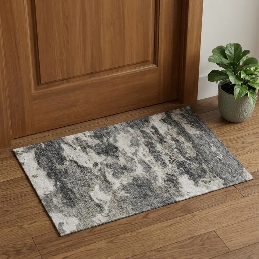 Black And Ivory Abstract Washable Area Rug With UV Protection Photo 1