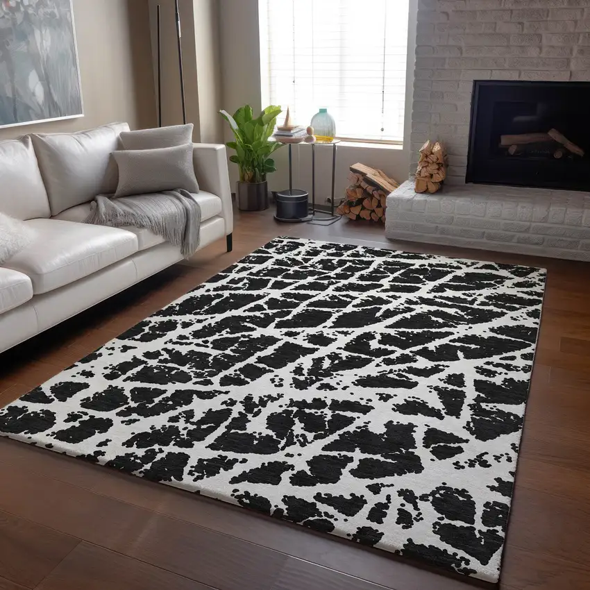 Black And Ivory Abstract Washable Area Rug With UV Protection Photo 6
