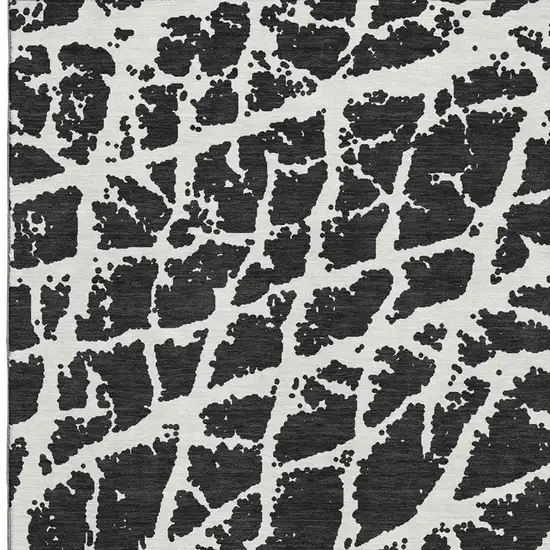 Black And Ivory Abstract Washable Area Rug With UV Protection Photo 3