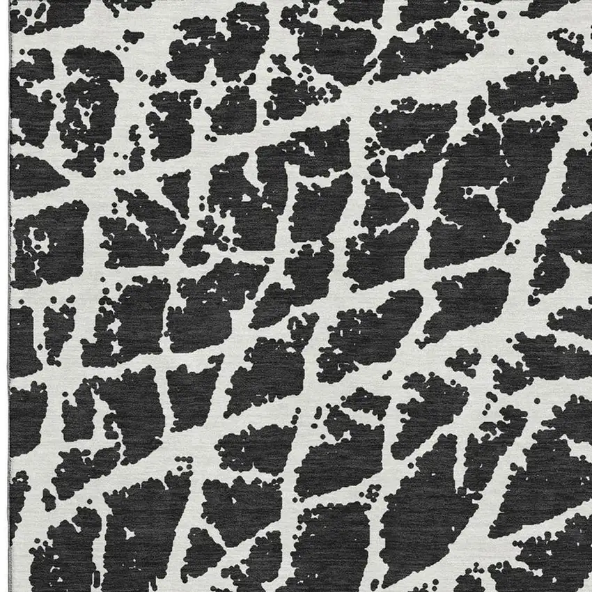 Black And Ivory Abstract Washable Area Rug With UV Protection Photo 3