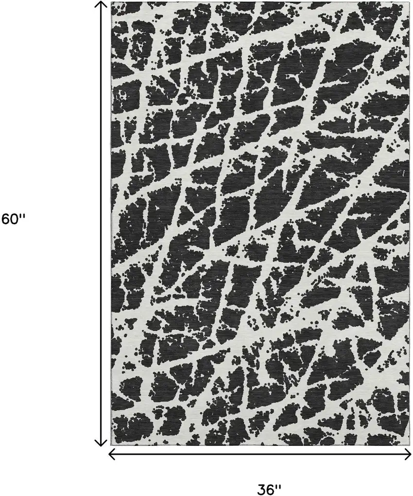 Black And Ivory Abstract Washable Area Rug With UV Protection Photo 3