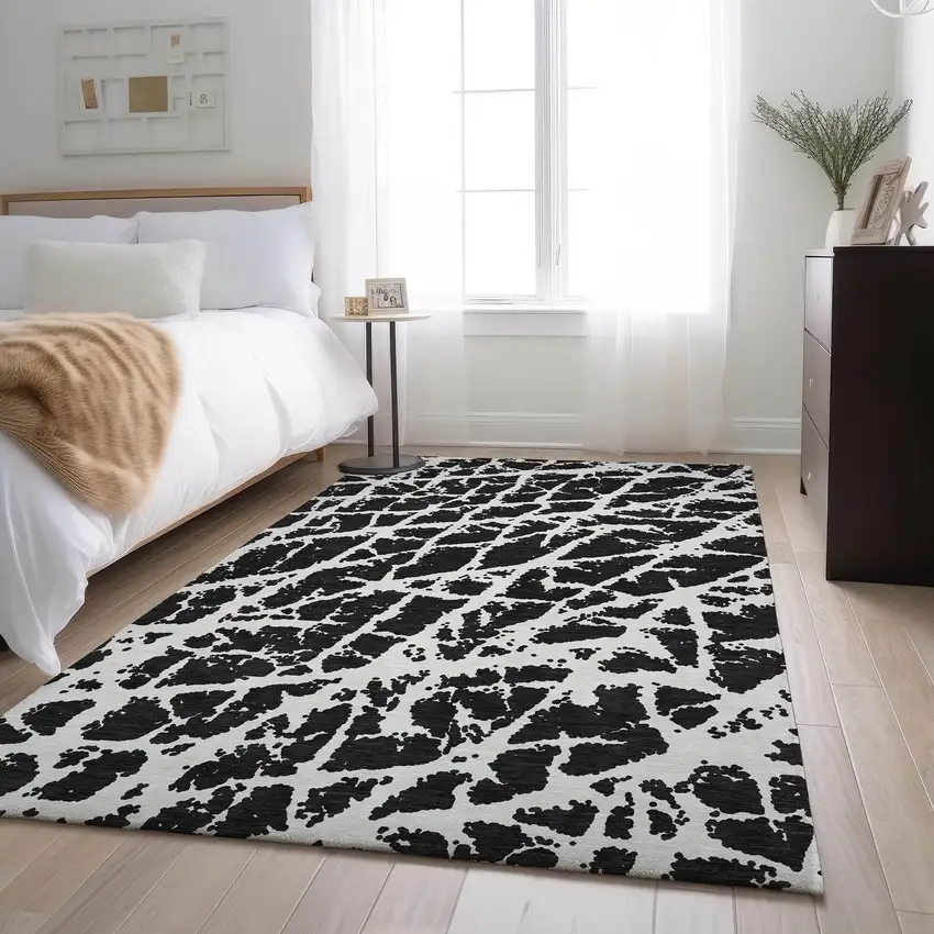 Black And Ivory Abstract Washable Area Rug With UV Protection Photo 5