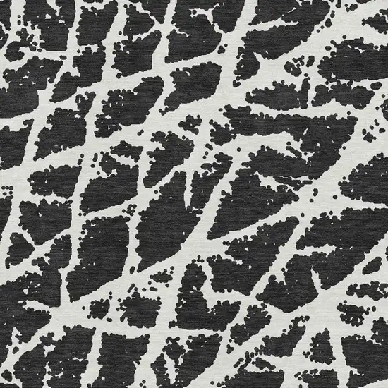 Black And Ivory Abstract Washable Area Rug With UV Protection Photo 3
