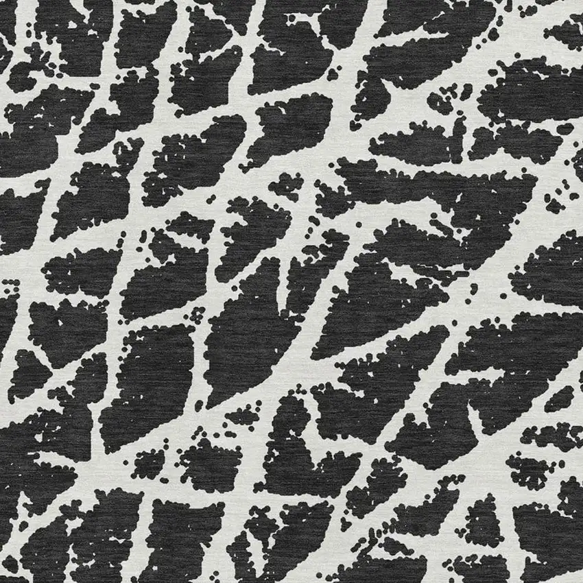 Black And Ivory Abstract Washable Area Rug With UV Protection Photo 3