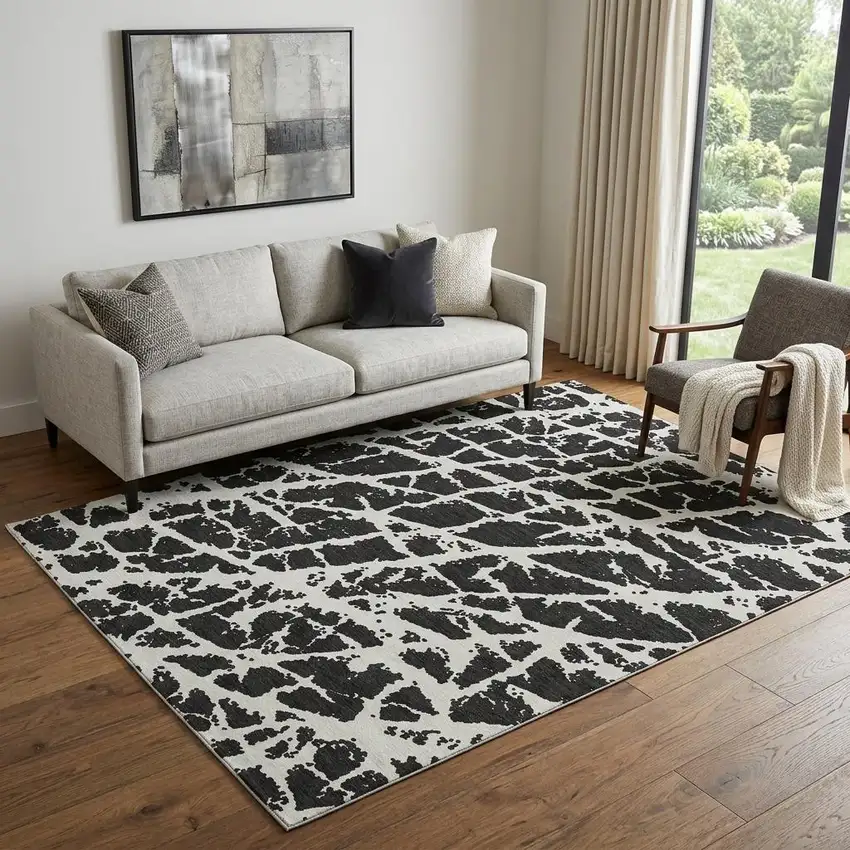 Black And Ivory Abstract Washable Area Rug With UV Protection Photo 1
