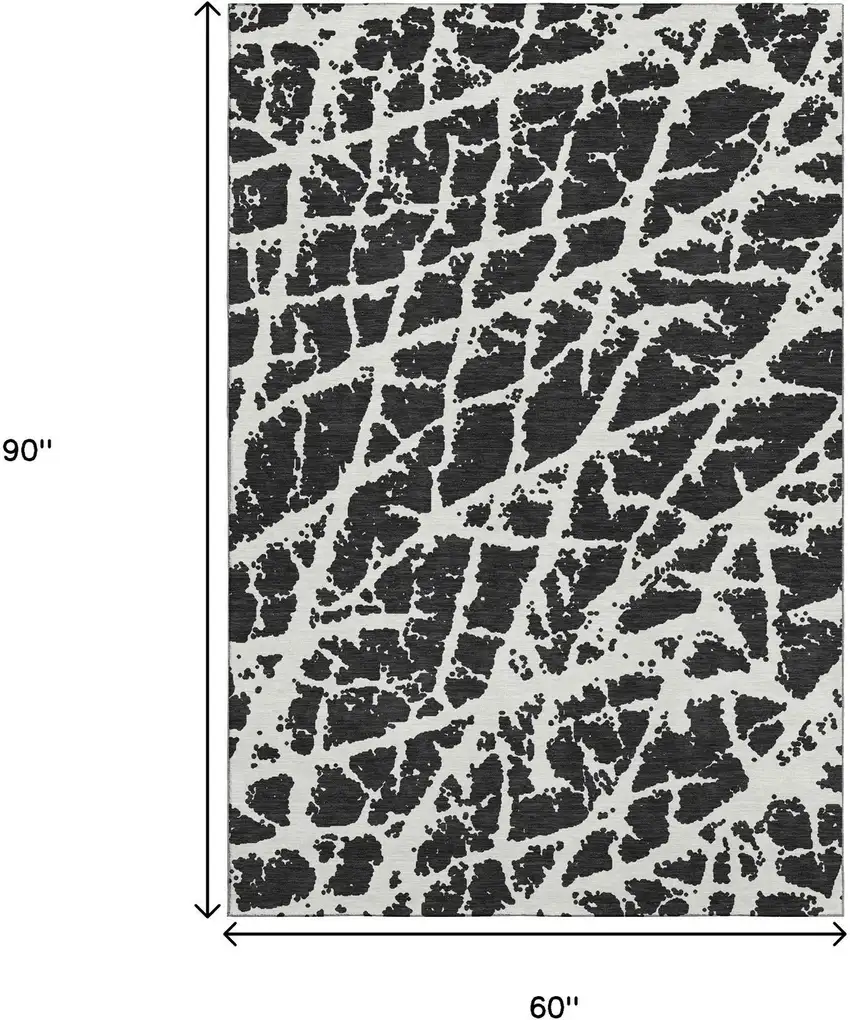 Black And Ivory Abstract Washable Area Rug With UV Protection Photo 3