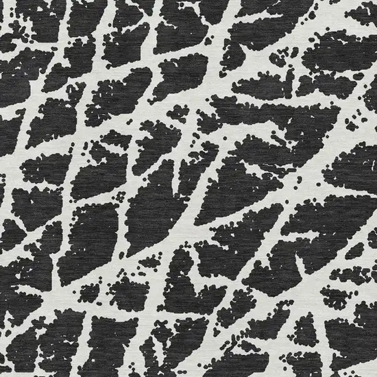 Black And Ivory Abstract Washable Area Rug With UV Protection Photo 3