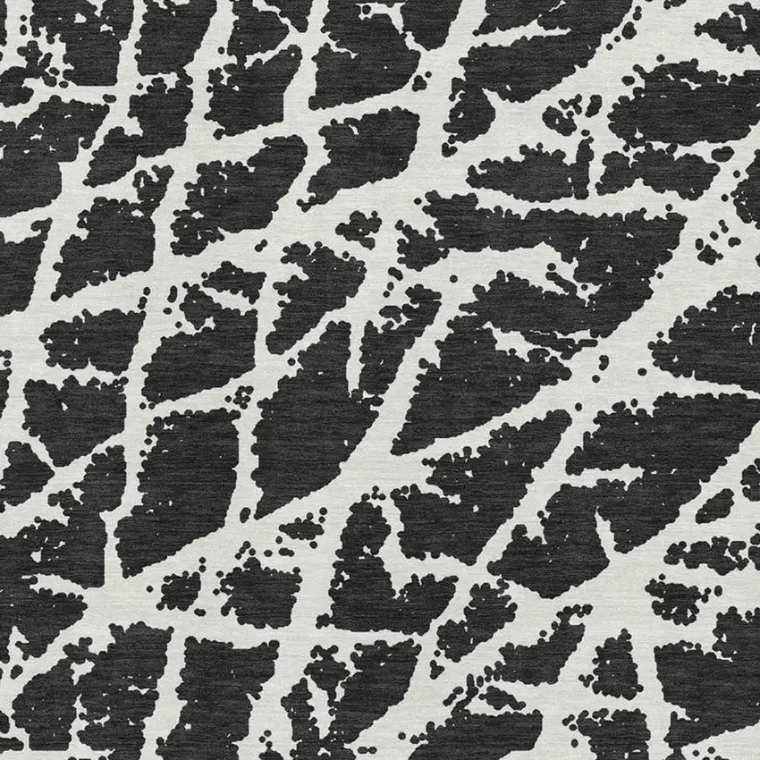 Black And Ivory Abstract Washable Area Rug With UV Protection Photo 3