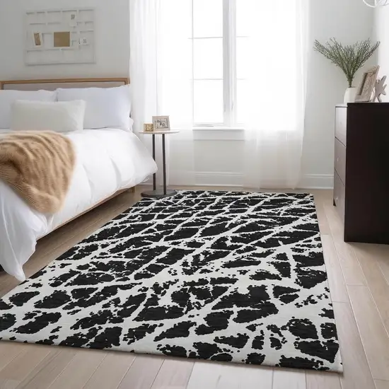 Black And Ivory Abstract Washable Area Rug With UV Protection Photo 5