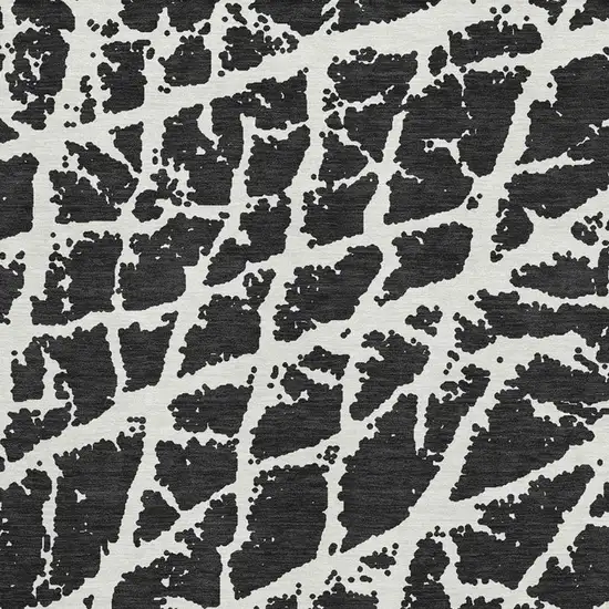 Black And Ivory Abstract Washable Area Rug With UV Protection Photo 3