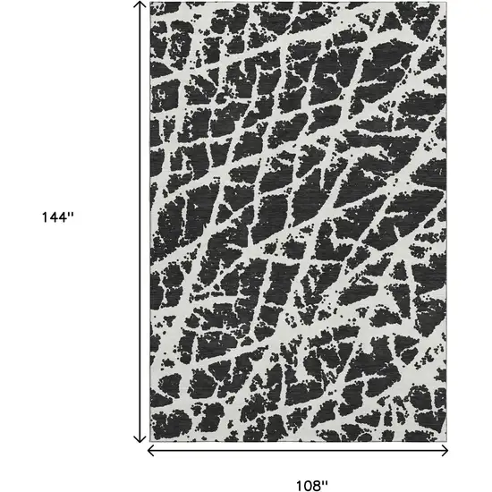 Black And Ivory Abstract Washable Area Rug With UV Protection Photo 3