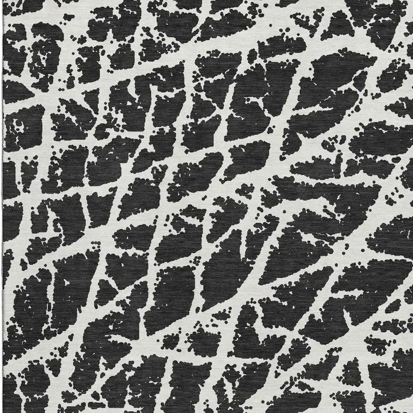 Black And Ivory Abstract Washable Area Rug With UV Protection Photo 4