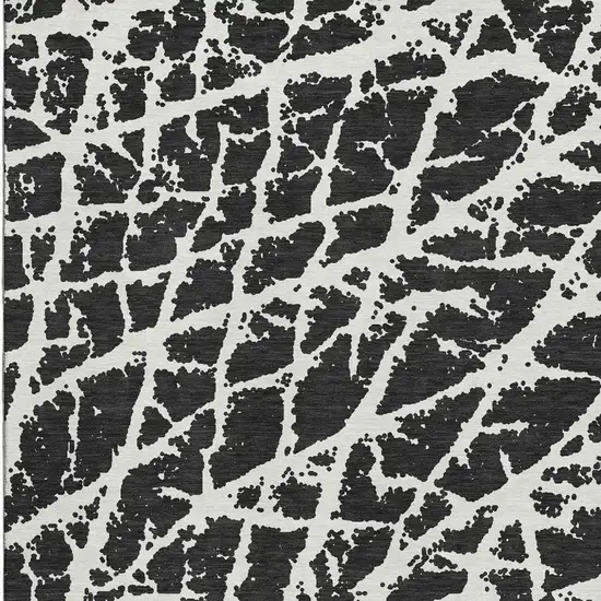 Black And Ivory Abstract Washable Area Rug With UV Protection Photo 3
