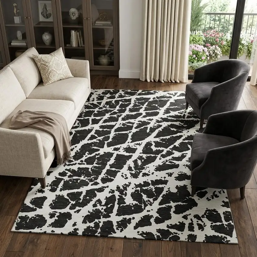 Black And Ivory Abstract Washable Area Rug With UV Protection Photo 1