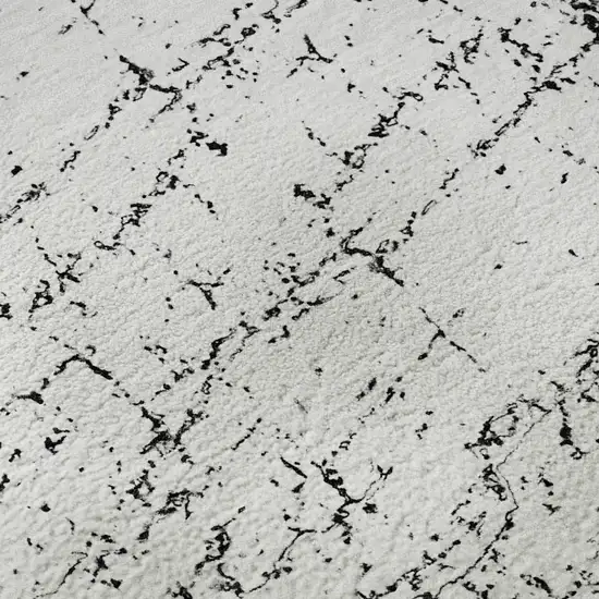 Black And Ivory Abstract Washable Area Rug With UV Protection Photo 3