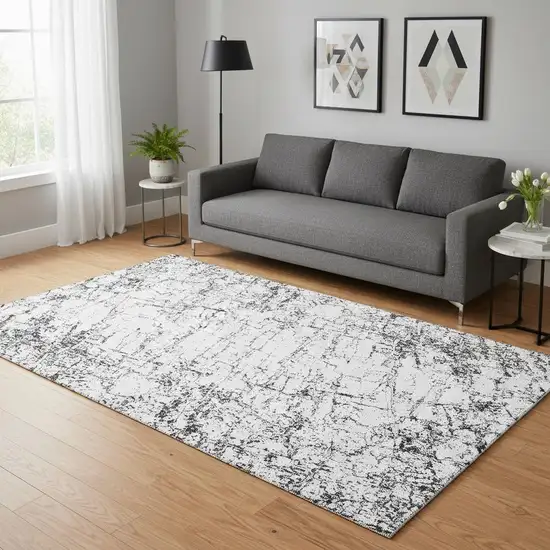 Black And Ivory Abstract Washable Area Rug With UV Protection Photo 2