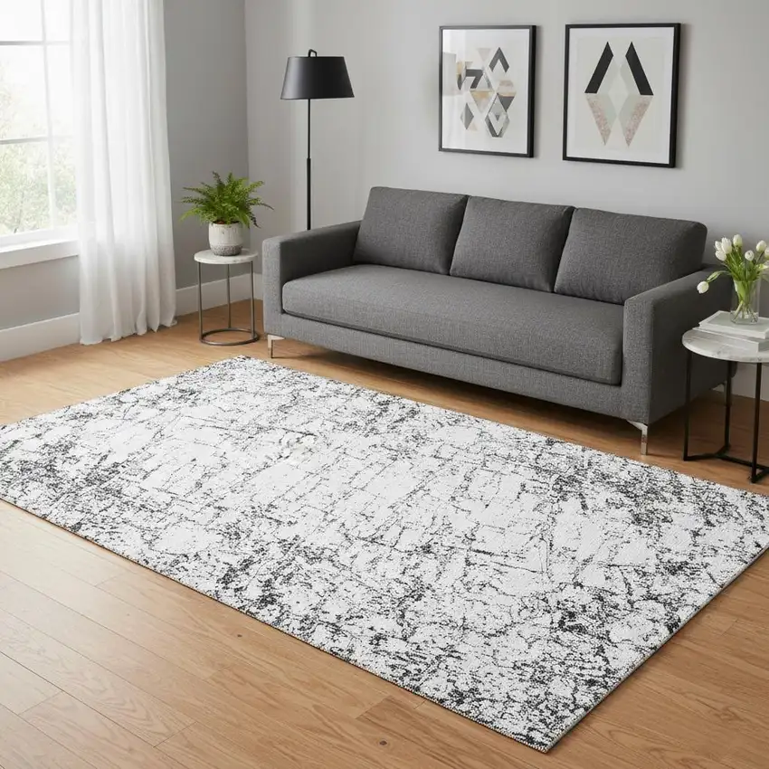 Black And Ivory Abstract Washable Area Rug With UV Protection Photo 2