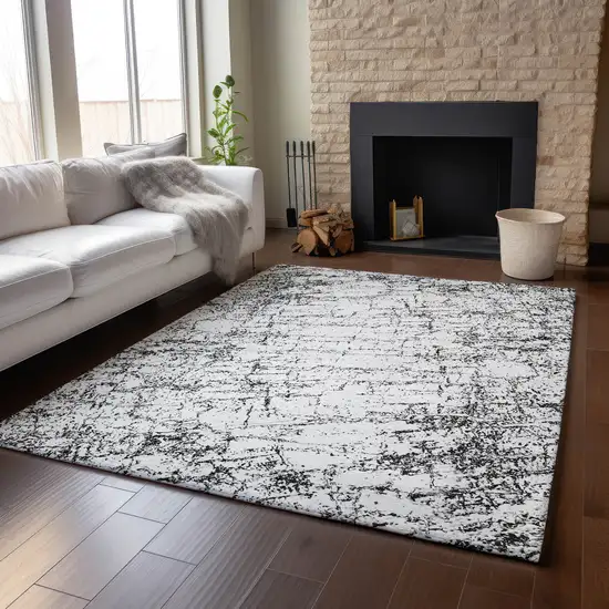 Black And Ivory Abstract Washable Area Rug With UV Protection Photo 6