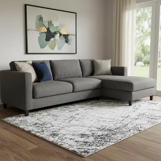 Black And Ivory Abstract Washable Area Rug With UV Protection Photo 1